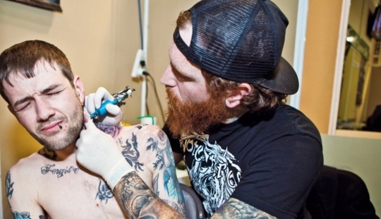 Pain and tears: the most painful places for tattoos according to tattoo record holders