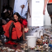 The audience just threw actual trash onto the runway in Milan