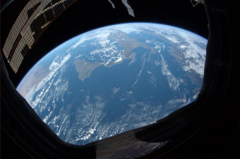 The earth in the lens astronaut Paolo Nespoli