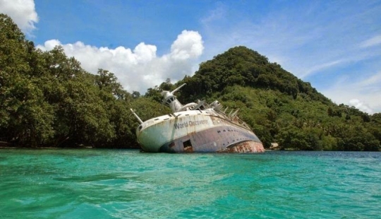 12 sunken ships, which you can see without scuba gear