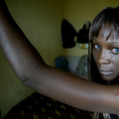 "Angels of death" is: photos of prostitutes from Nigeria, where AIDS is claiming 10 million lives a year