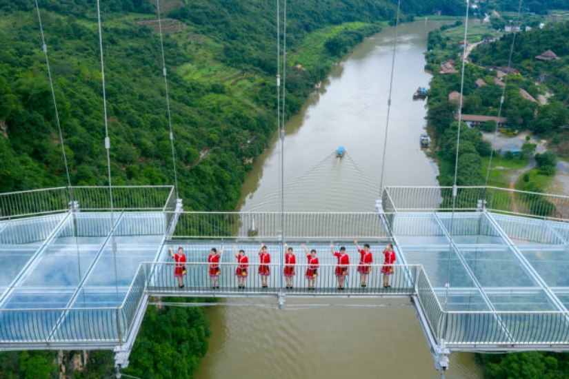 China has opened the suspended glass bridge and immediately set several world records