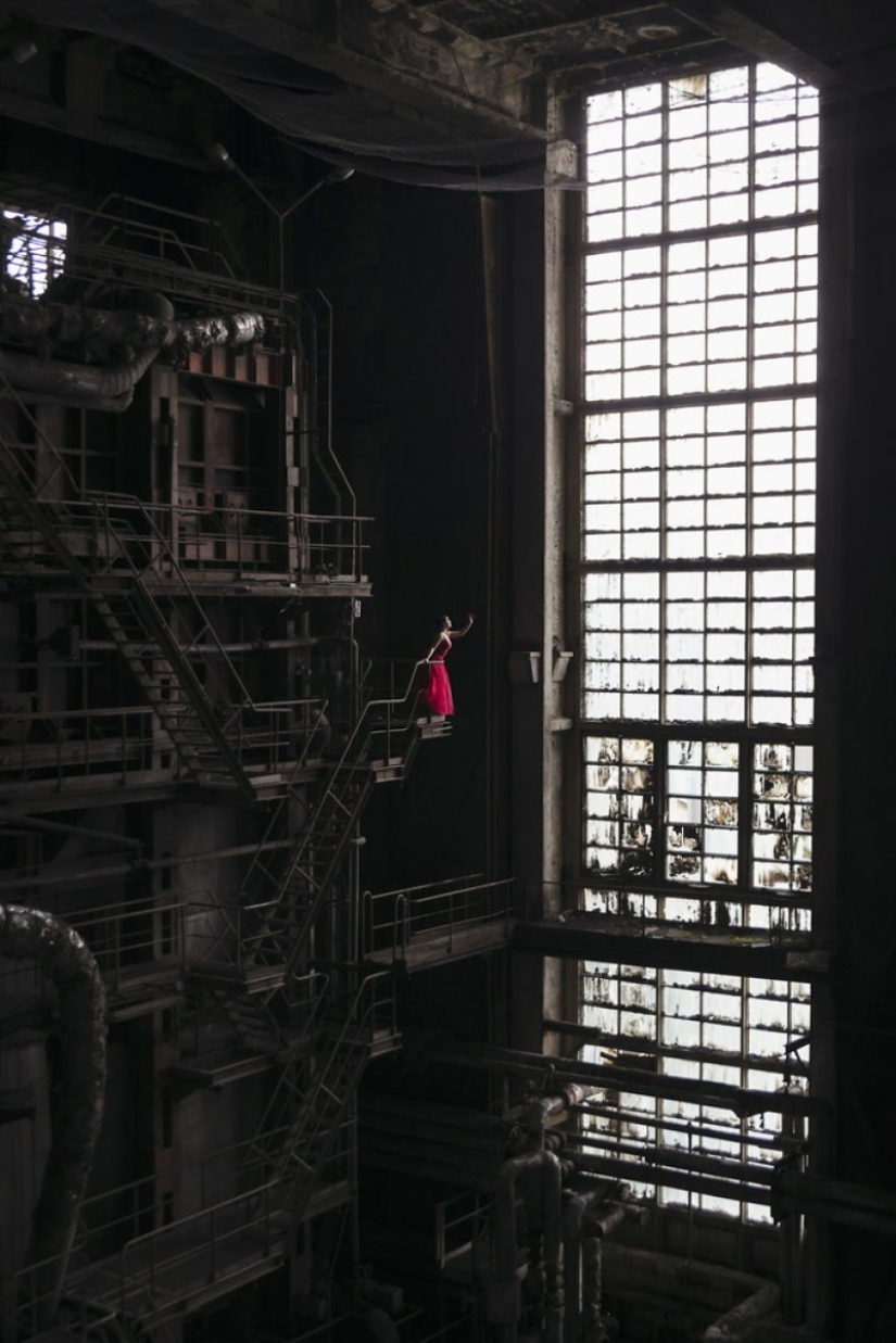 Guy photographing his girlfriend in an abandoned locations across Europe