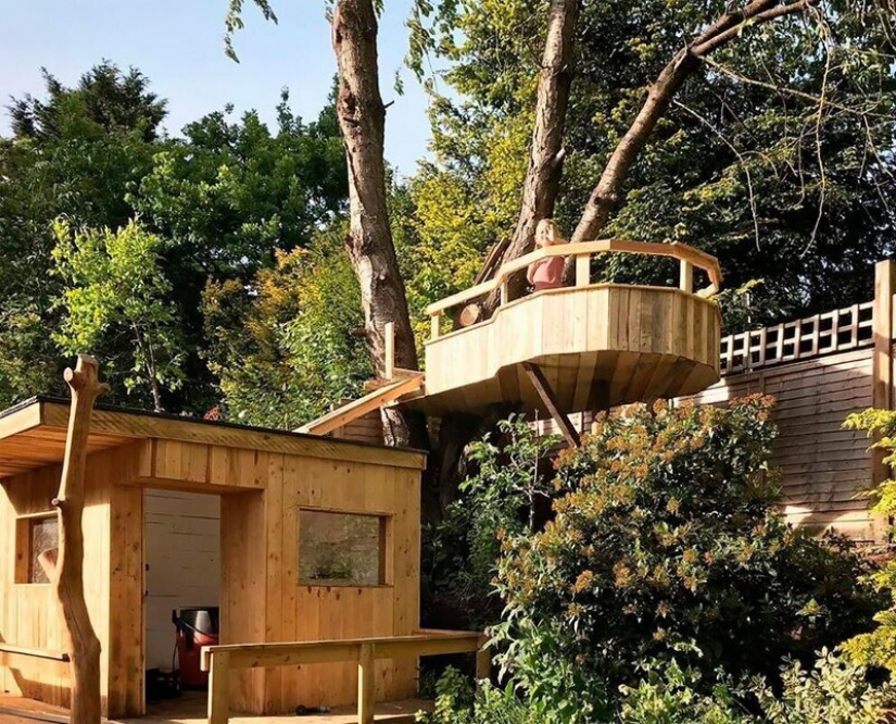 My daughter loved it! Tree house from old boards, which was built by a caring father