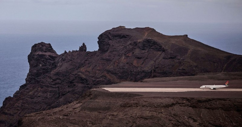 On the island where Napoleon was buried, idle the most useless airport in the world