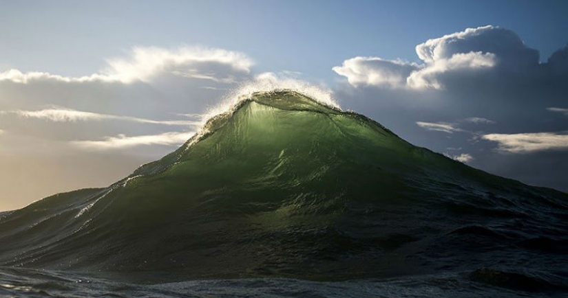 Ray Collins has frozen ocean waves and made them look like majestic mountains