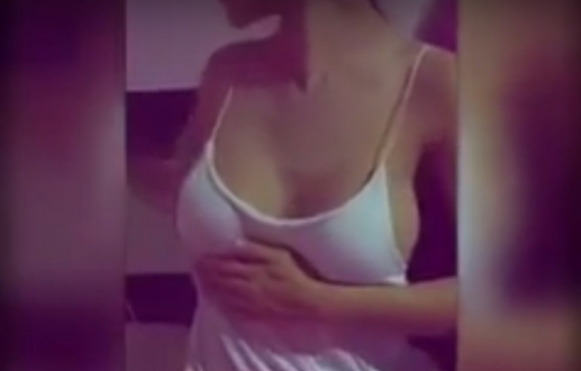 Thai model showed how to detect silicone breast