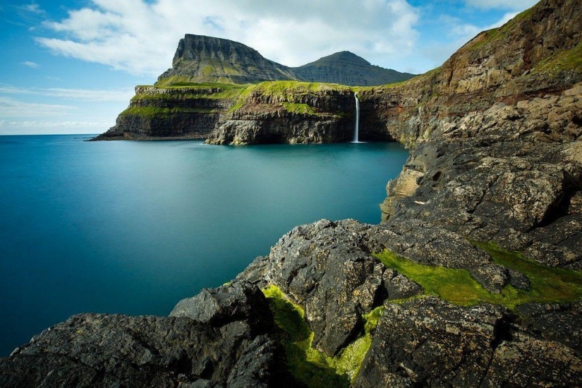 The picturesque village of Gasadalur is the most beautiful place of Faroe Islands
