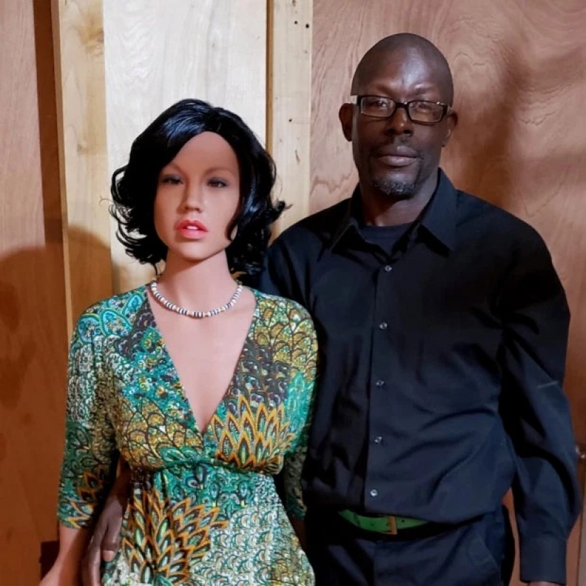 The third is not superfluous: the couple claim that the sex doll had saved their polygamous marriage