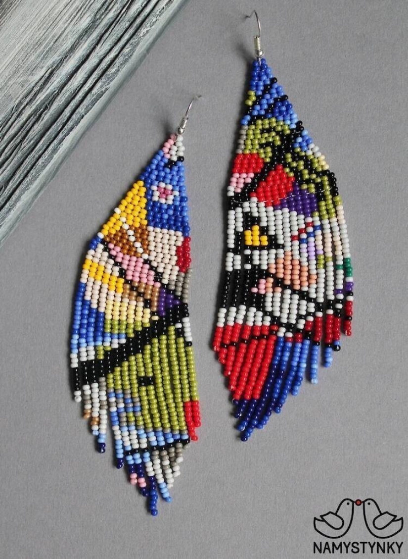 A talented Ukrainian woman makes beaded earrings based on the plots of famous paintings