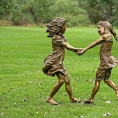 Almost live: incredibly realistic sculpture of a happy childhood