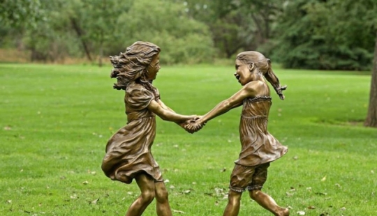 Almost live: incredibly realistic sculpture of a happy childhood