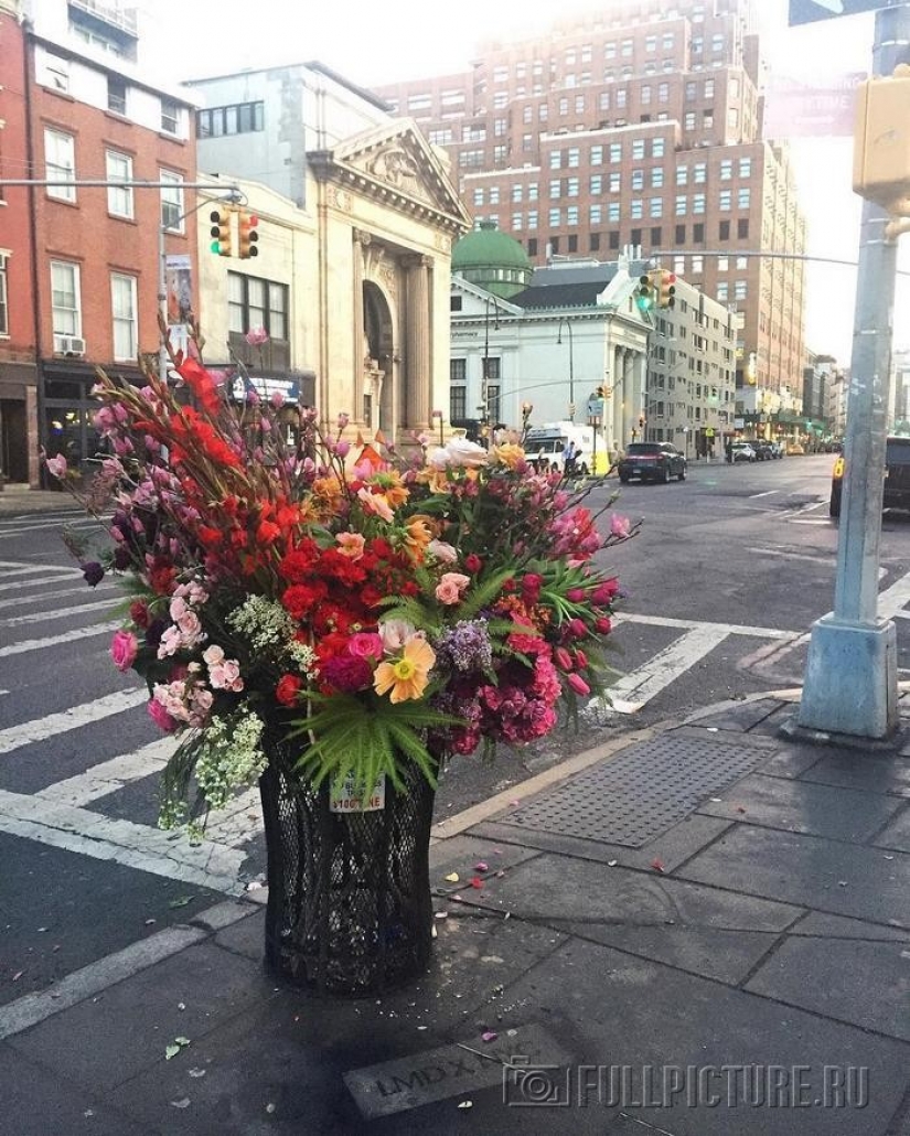 Crime or art? Someone is turning New York City trash cans into giant vases of flowers.
