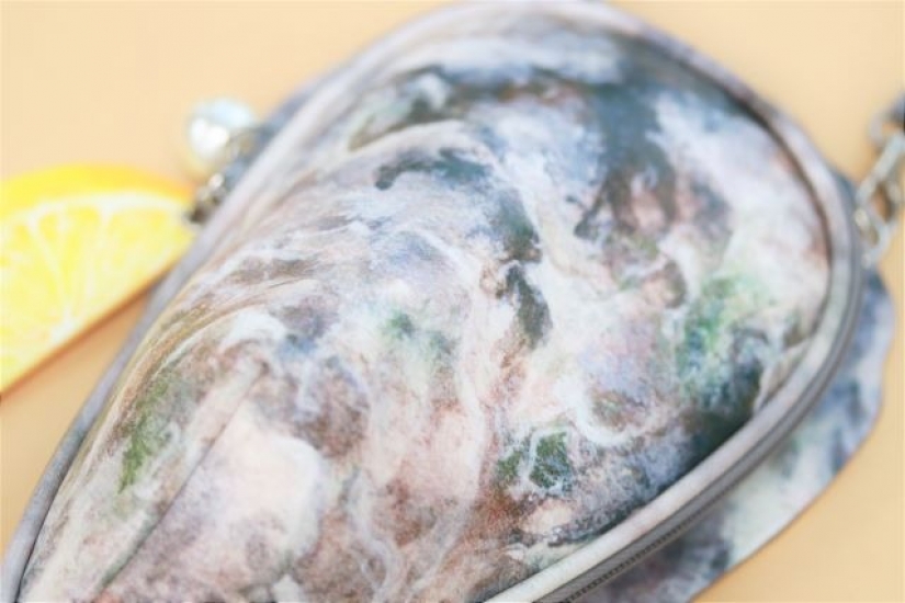 Delicacy on the shoulder: a Japanese firm has created an oyster-shaped handbag