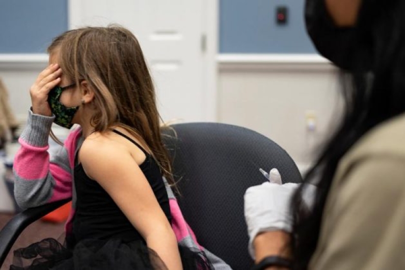 In photos: children in the US receive a vaccine from COVID