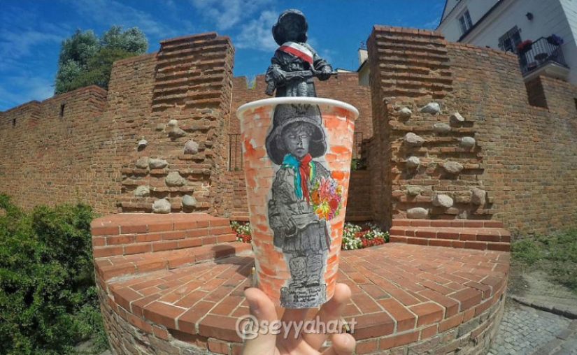 No art without a glass: a traveler paints coffee cups for a living