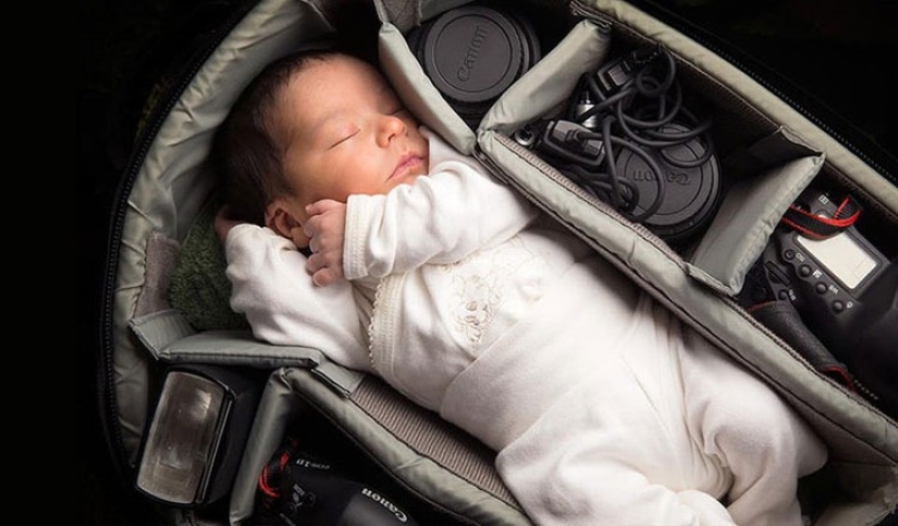 Photographers take pictures of their tiny children in photo bags