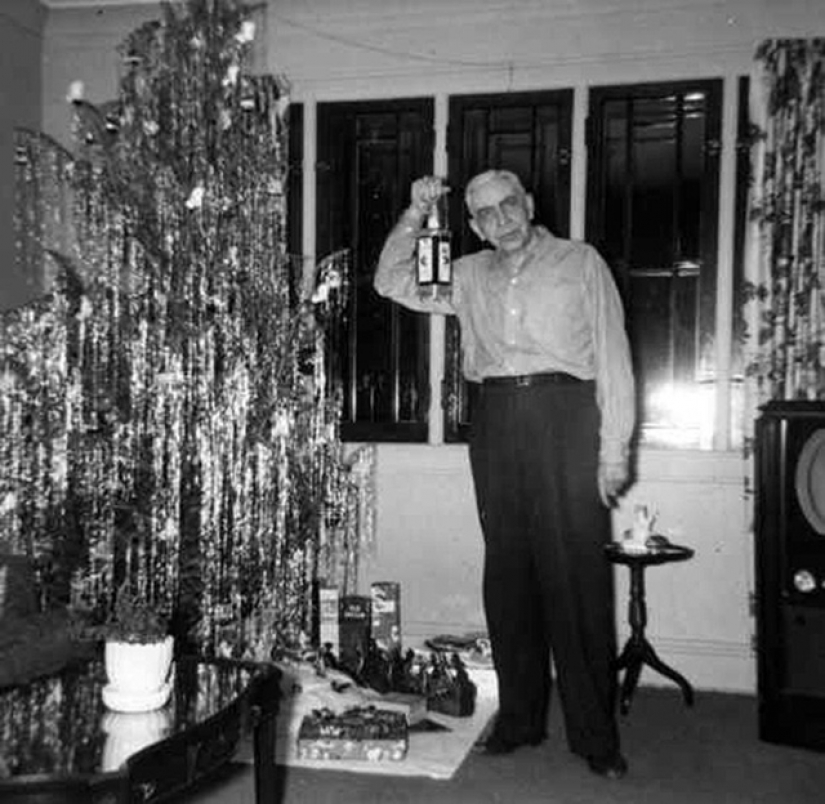 Playful photo under the Christmas tree from old albums