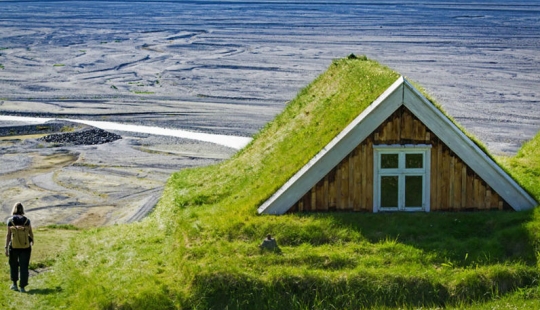 Scandinavian houses with green roofs that look like a fairy tale