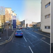 Silent protest: A British man has been standing in the middle of the road in the same place for seven years, creating traffic jams