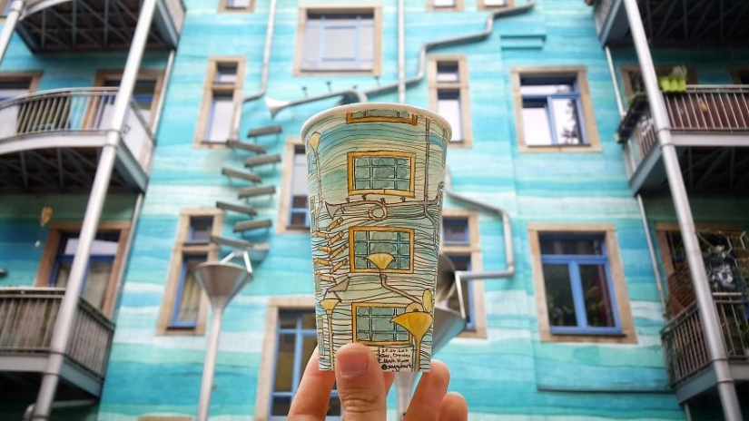 The artist travels the world and uses paper cups as canvas