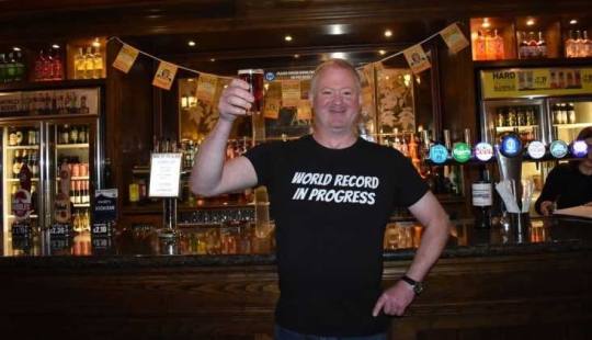 The Briton went to pubs for a day to get into the Guinness Book of Records
