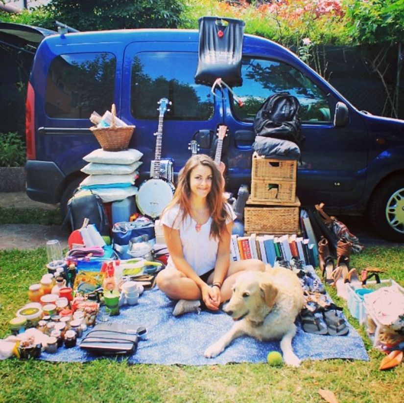 The girl has converted an old van into a motorhome and travels the world with his dog