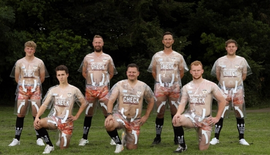 Why did the players of the British football club put on a transparent uniform