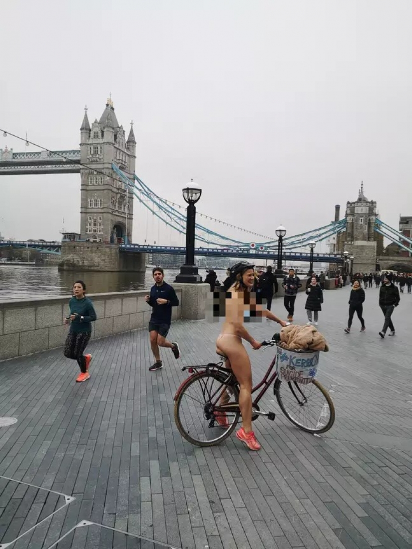 Why did this British woman ride her bike naked in London