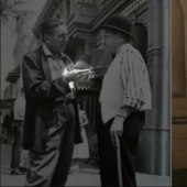 Why Walt Disney shows two fingers in all his photos