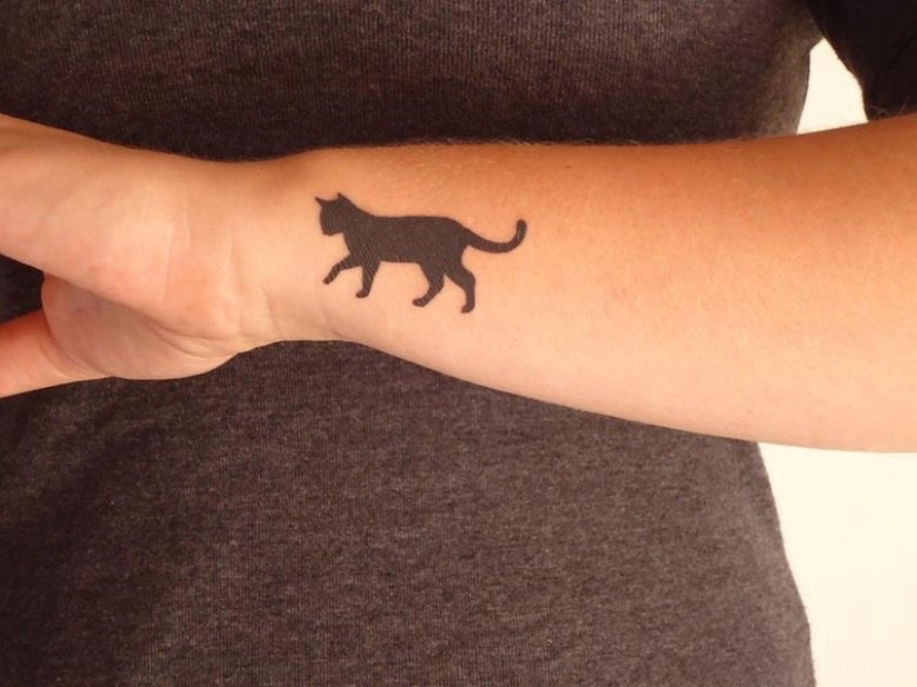 20 tatuajes minimalistas para amantes de los gatos