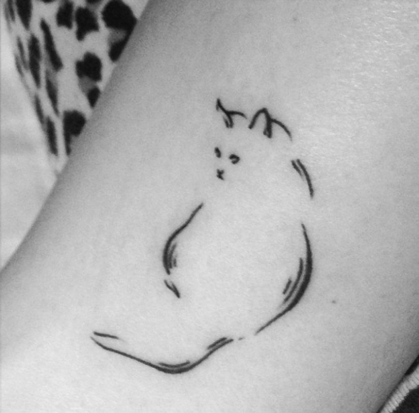 20 tatuajes minimalistas para amantes de los gatos