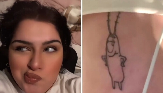 25 of the lucky winners in the competition for the stupid tattoo