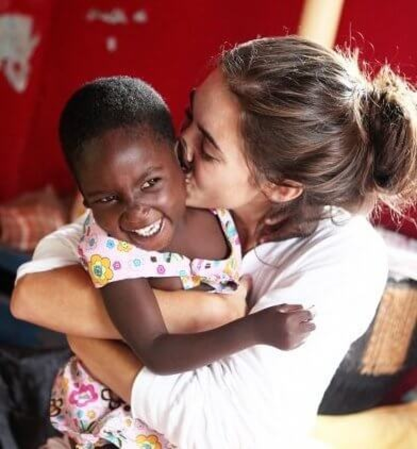 A 23-year-old American woman went to Uganda and adopted 13 children