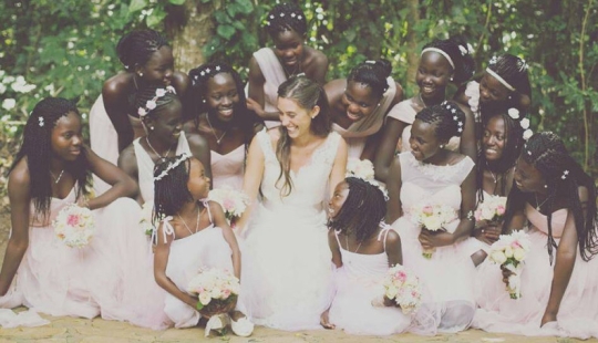A 23-year-old American woman went to Uganda and adopted 13 children
