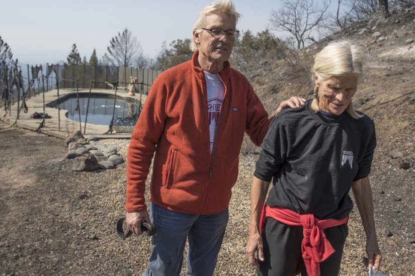 A couple from California escaped from a fire after sitting in a pool for six hours