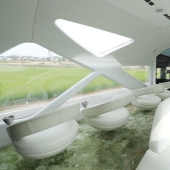 A new luxury train with two-story compartments and panoramic windows has been launched in Japan