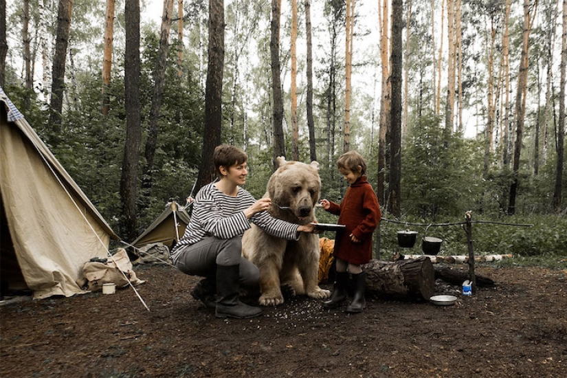 A Russian family befriended a bear in the forest for an anti-hunting campaign