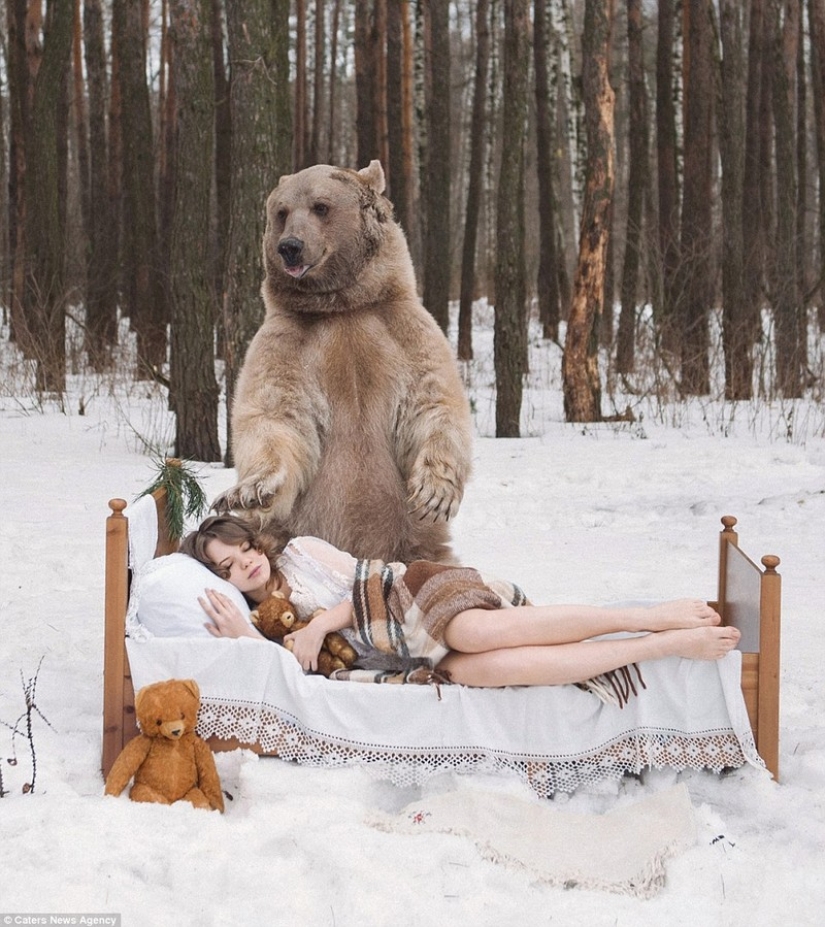 A snowy photo shoot of two models from Russia in an embrace with a bear shocked Europe