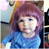 An alternative mother allows her 2-year-old daughter to dye her hair and wear makeup