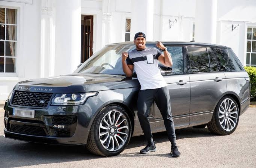 Anthony Joshua is a champion millionaire who enjoys a chic life for free