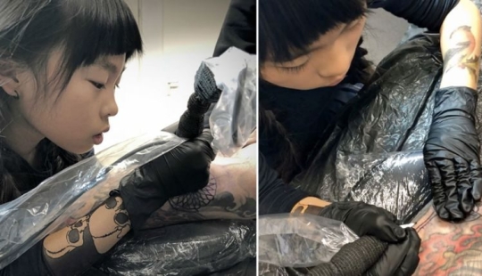 Apple from the apple tree: A 10-year-old Japanese woman gets a tattoo, following in her father's footsteps