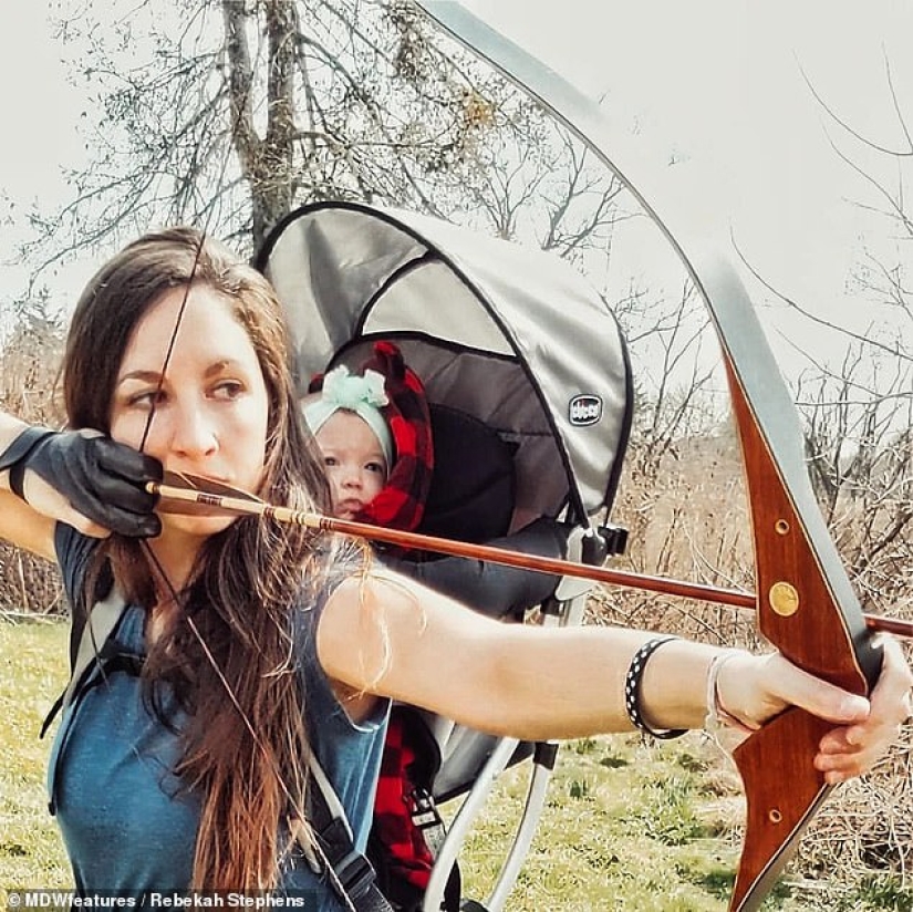 Basic instinct: a mother goes hunting with a 9-month-old baby behind her back