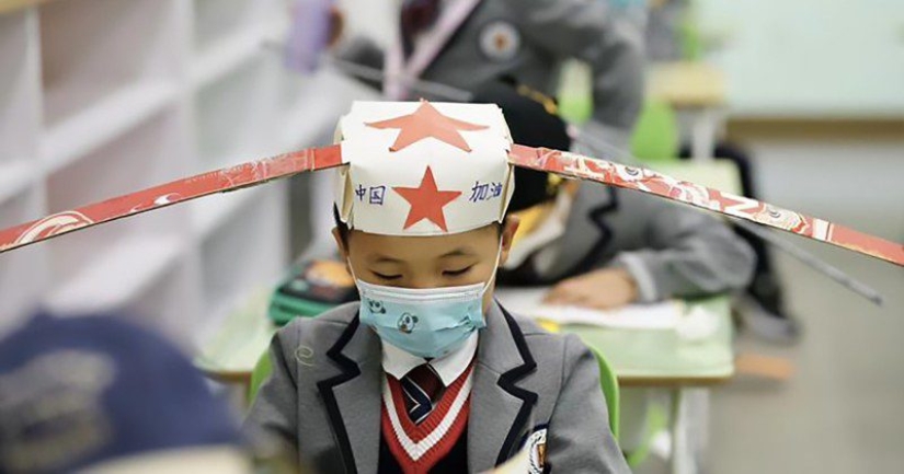 Chinese Kids Go to School wearing Funny Hats for Social Distancing