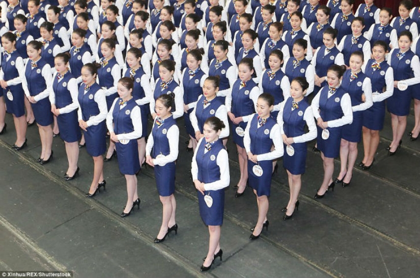 Chinese schoolgirls pose in bikinis hoping to become a flight attendant or model