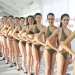 Chinese schoolgirls pose in bikinis hoping to become a flight attendant or model