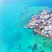 Dame un peinado y te daré pescado para almorzar: cómo se llevan mil personas en una isla del tamaño de un campo de fútbol