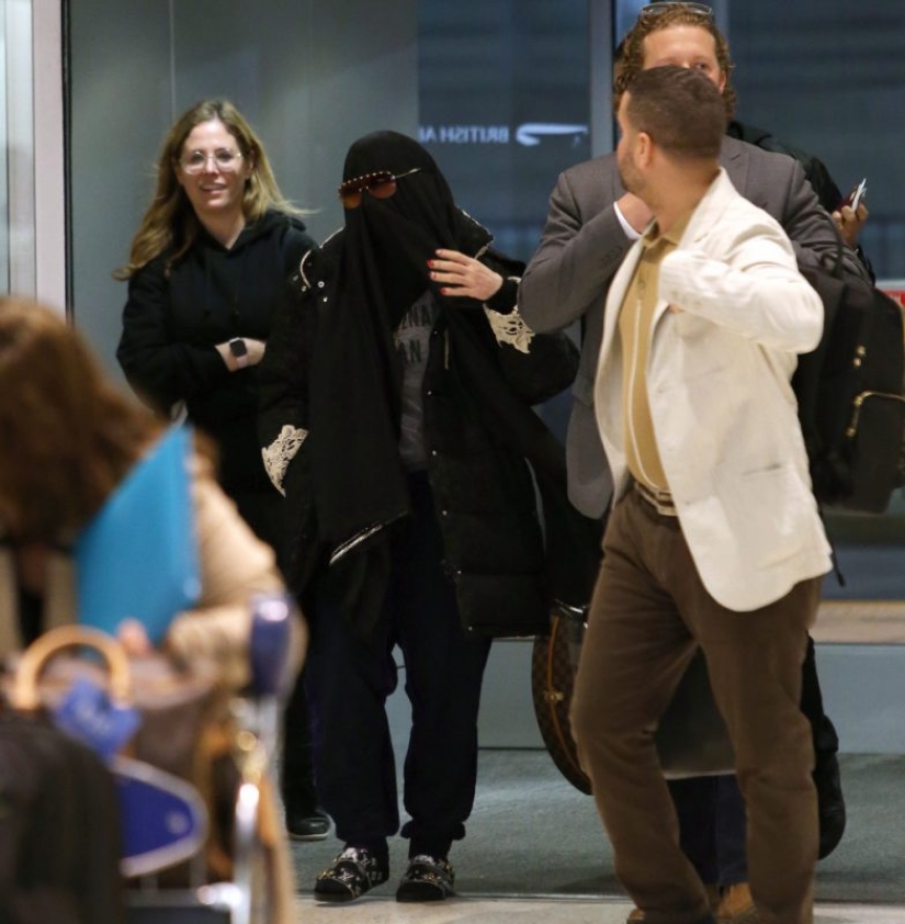Gulchatai, open your face! Madonna was forced to take off her burqa at the airport