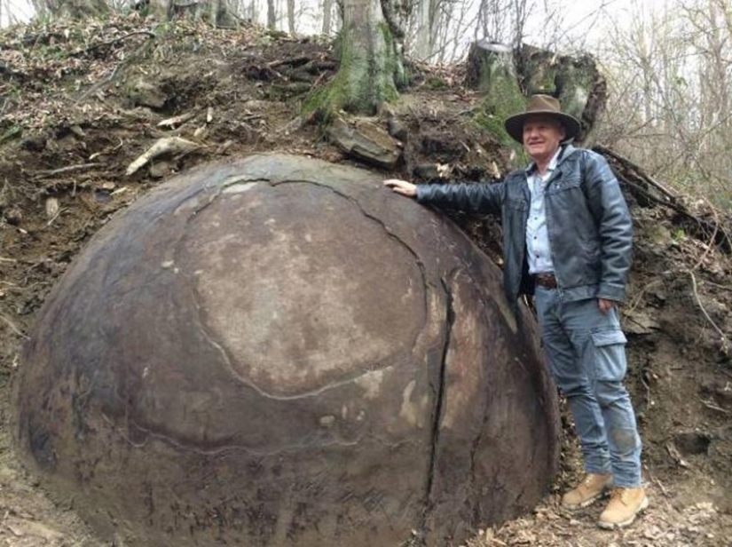 Huge stone ball in the middle of the forest