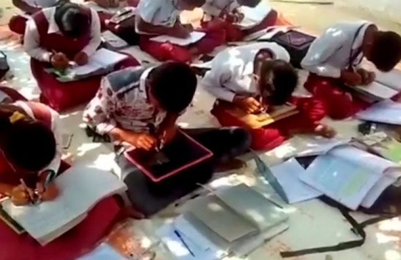 In an Indian school, all children write with both hands, although only 1% of the world's population can do it